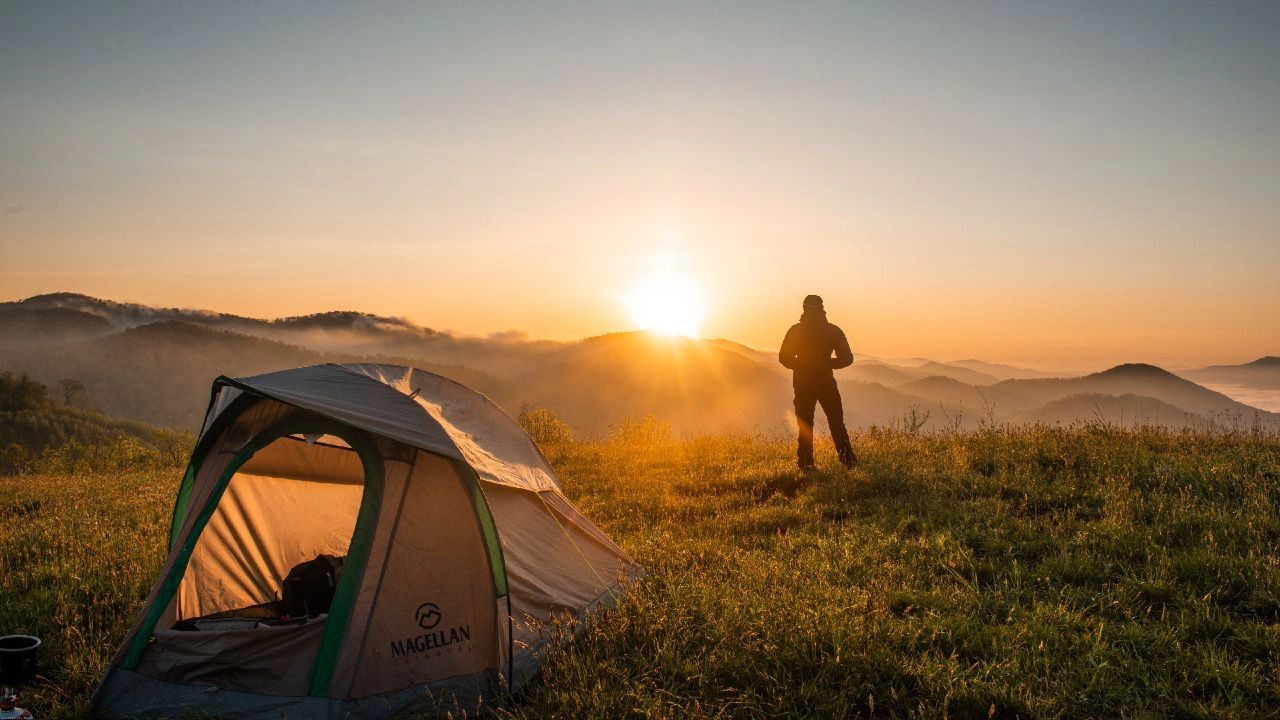 Scenic camping landscape at sunrise